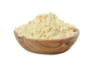 Corn flour in wooden bowl isolated on white