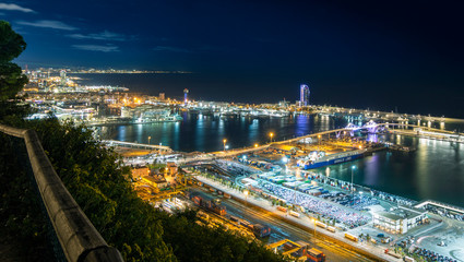  View of the port of Barcelona at night, Catalonia, Spain