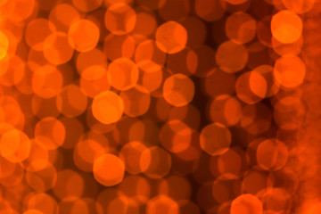 Glowing orange circles on a dark background.