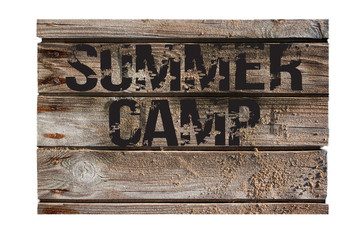 "summer camp" written on old wood