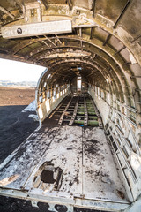 Inside the DC-3 plane wreck in Iceland at morning time