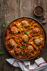 meatballs in pasta nests with tomato sauce