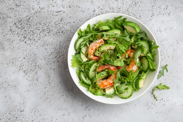 healthy avocado and prawn salad in white  bowl