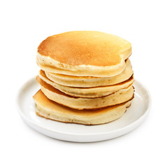 Stack of delicious pancakes on plate isolated on white