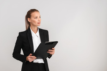 Confident blonde business woman wearing suit