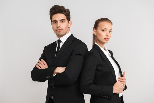 Confident young business couple