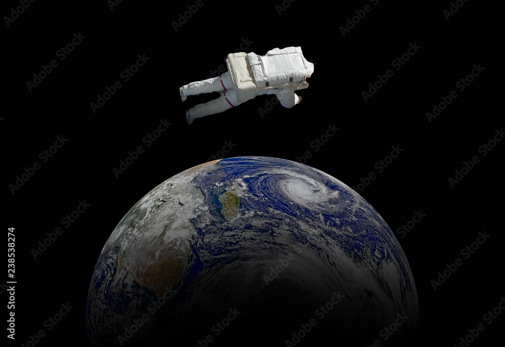 Canvas Prints abstract wallpaper or astronaut flying in outer space near the earth . elements of this image furnis