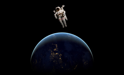 abstract wallpaper or astronaut flying in outer space near the earth . Elements of this image...