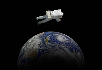 abstract wallpaper or astronaut flying in outer space near the earth . Elements of this image furnished by NASA f