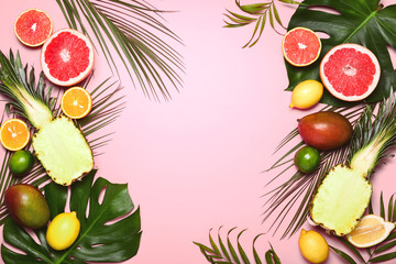 Tropical summer background with various tropical fruits