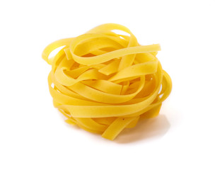 Homemade raw egg noodles on a white background.