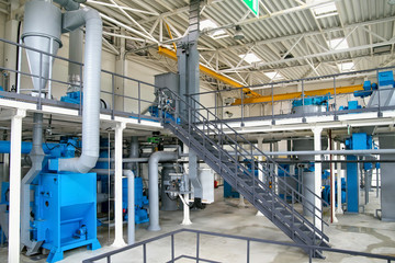 Fototapeta premium View of the equipment at the plant for the production of rapeseed oil.