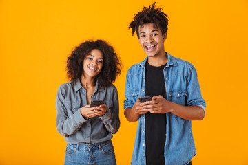 Cheerful young african couple standing