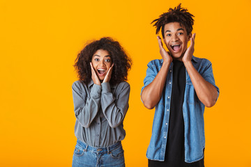 Cheerful young african couple standing