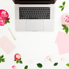 Obraz na płótnie Canvas Laptop, roses flowers, diary, pen and envelope on white background. Flat lay. Top view. Feminine composition with copy space