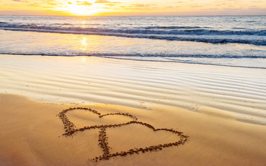 Love, heart on sea beach