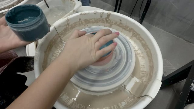 Point of view at painting the pottery