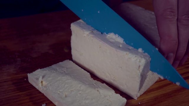 Healthy food. Goat cheese on a wooden cutting board. fresh white greek feta cheese, 1920x1080, HD