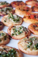 Freshly baked mini pizzas cocas