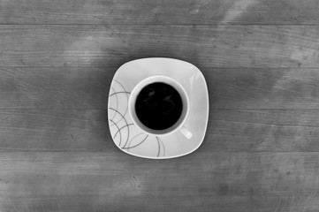 Kaffeetasse von oben in schwarz-weiss