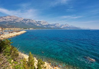 Fototapeta na wymiar Coast of the Mediterranean Sea with a view on the mountains. Kemer