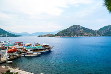 Fototapeta na wymiar beautiful scenery of the mountains in the sea Icmeler Turkey