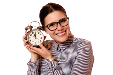 Junge Frau mit Wecker 