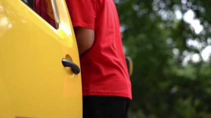 Man from postal service delivers cardbox