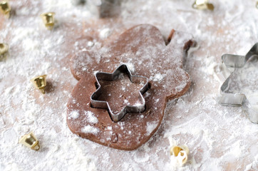 Preparation of Christmas cakes. Scattered flour on the table.