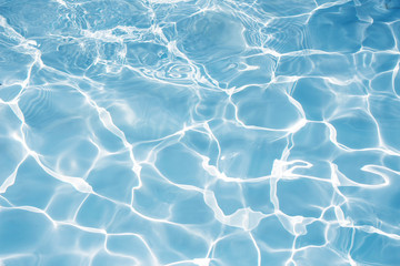 Texture of water in swimming pool for background
