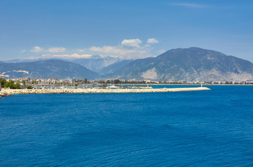 Fototapeta premium Lighthouse on the Finikie embankment, Turkey