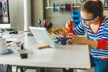 Young girl working on a school project