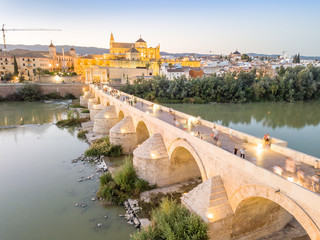 Obraz premium Aerial view of Roman bridge and Mosque - Cathedral of Cordoba, Andalusia, Spain