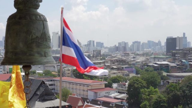 Royal and Buddhist flags fluttering over Bangkok, Thailand