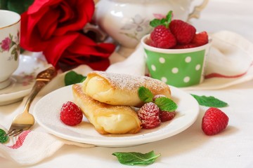 Cheese Blintz - Valentines day breakfast concept, selective focus
