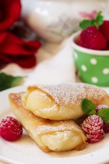 Cheese Blintz - Valentines day breakfast concept, selective focus
