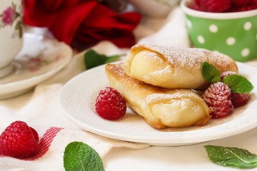 Cheese Blintz - Valentines day breakfast concept, selective focus