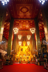 Fototapeta na wymiar Buddha Statue In Wat Phra That Hariphunchai, Lot Colour Full Culture In Wat Hariphunchai Temple Lamphun Thailand Of Lanna, Northern Thailand.