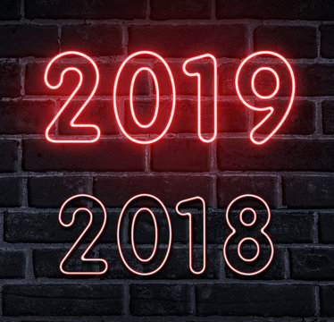 Hello New Year. Neon glowing 2019 on wall