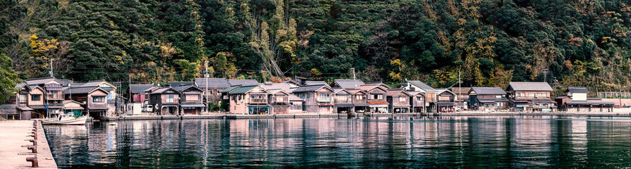 Panorama view of Ine-Cho and Funaya houses at Ine bay in Autumn , Kyoto, Japan