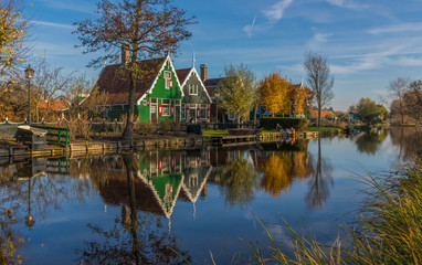 Obraz premium Zaanse Schans, Netherlands - considered a real open air museum, Zaanse Schans presents a collection of well-preserved historic windmills and houses