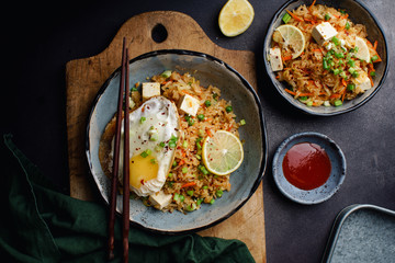 Vegetarian fried rice with tofu, peas and vegetables. Asian cuisine, healthy lunch