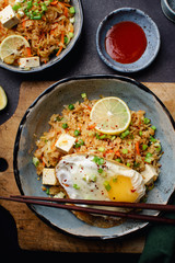 Vegetarian fried rice with tofu, peas and vegetables. Asian cuisine, healthy lunch