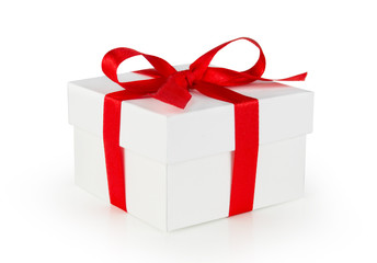 White One gift box with red ribbon bow, isolated on white background