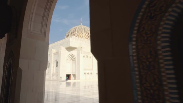 View of the Sultan Qaboos Grand Mosque from arched passageway