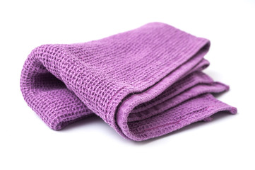 closeup of purple cleaning towel on white background