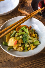 Stewed vegetables in ceramic bowls.