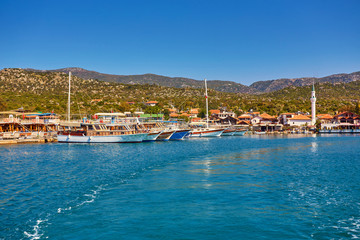 Obraz premium Marine parking of boats and yachts in Kekova is a sunken city in Turkey.