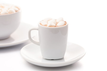 Tiny LIttle Mug Filled with Hot Chocolate for a Child called a Babyccino