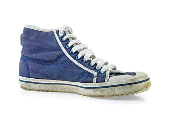 Old and dirty blue canvas sneakers on white background